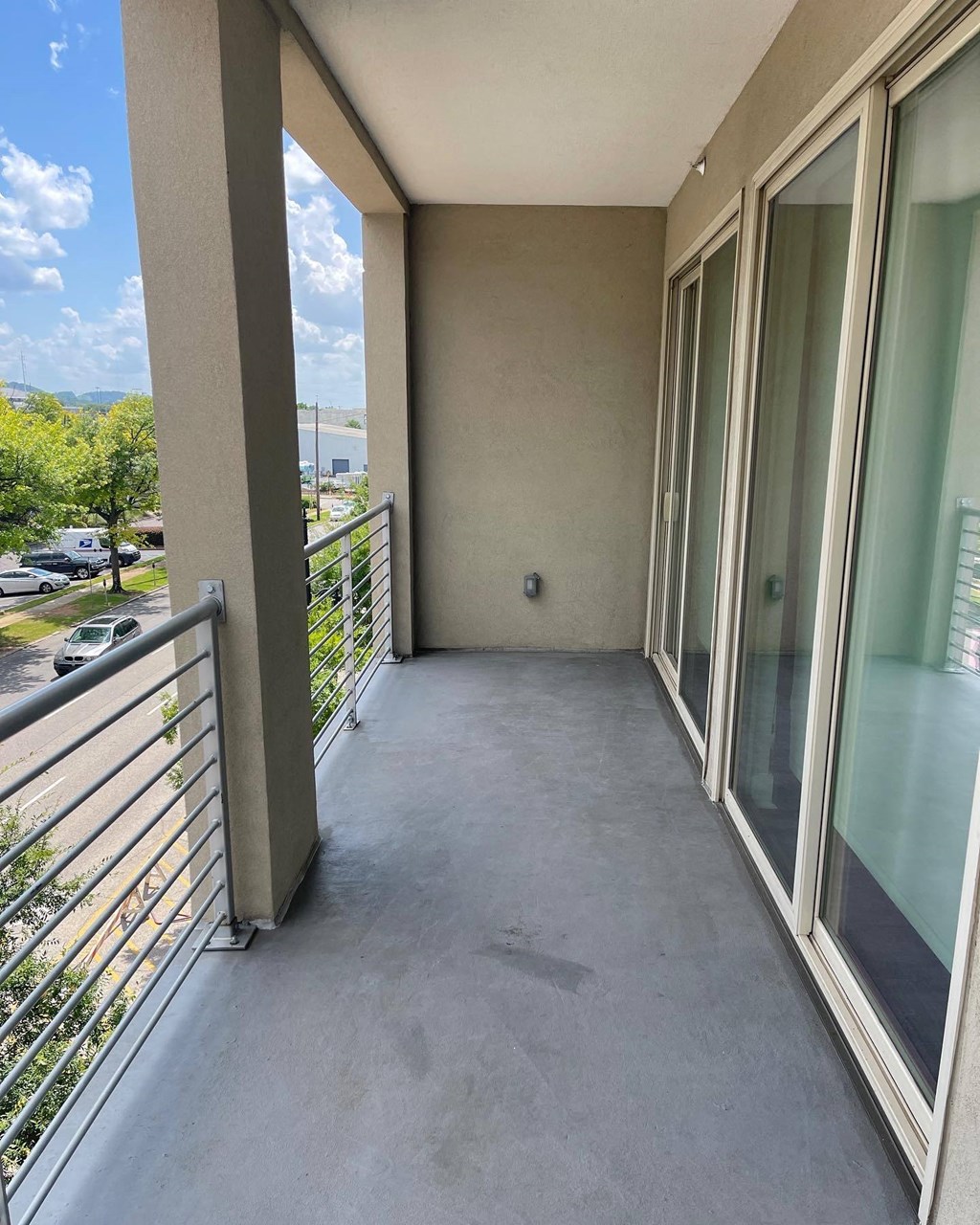 Large balcony with sliding doors at Flats on 4th Apartments in Birmingham, AL