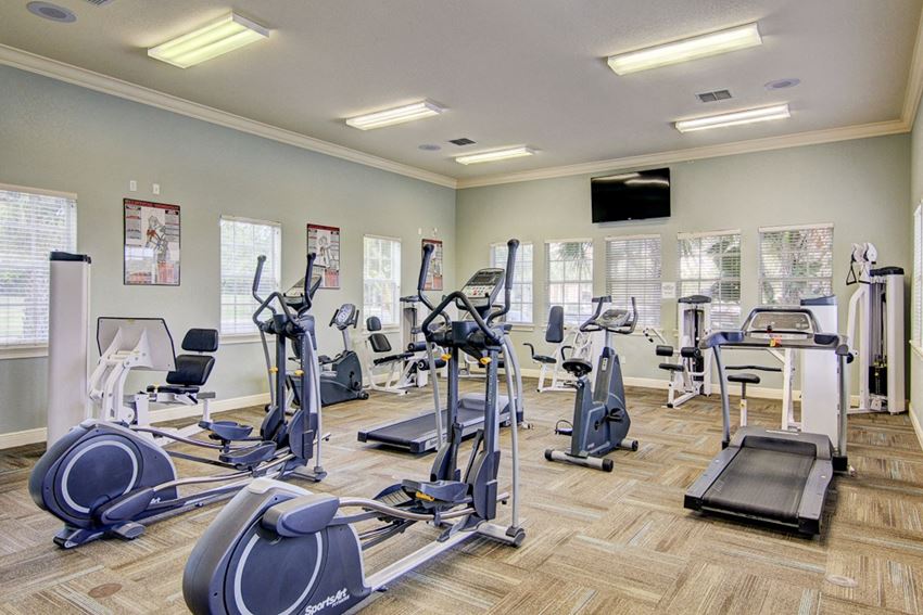cardio and resistance fitness equipment at Legacy at Crystal Lake Apartments in Port Orange, Florida 24-hr fitness center at Legacy at Crystal Lake Apartments in Port Orange, Florida - Photo Gallery