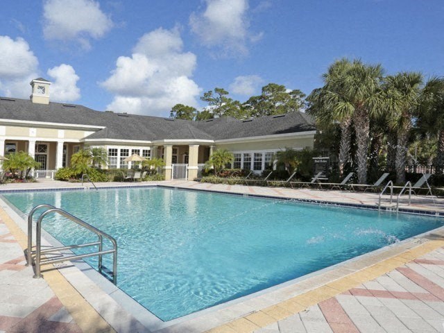 sparkling pool at Legacy at Crystal Lake Apartments in Port Orange, Florida