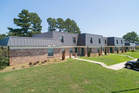 a large building with a car parked in front of it