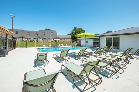our apartments have a pool and lounge chairs