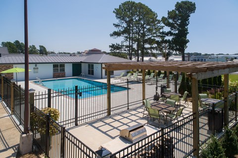 our apartments have a large pool and a patio