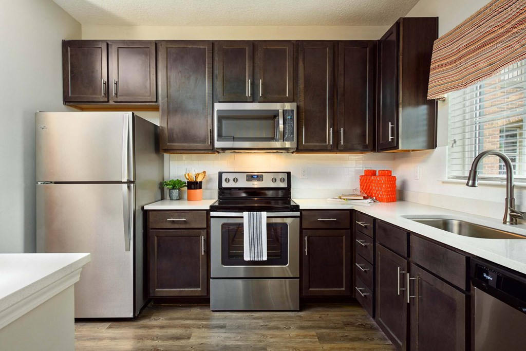 Kitchen with quartz countertop at Tapestry Bocage Apartments in Baton Rouge, LA