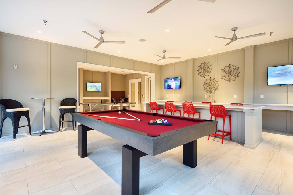 Billiards and Bar area at Tapestry Bocage Apartments in Baton Rouge, LA Sports Pub at Tapestry Bocage Apartments in Baton Rouge, LA