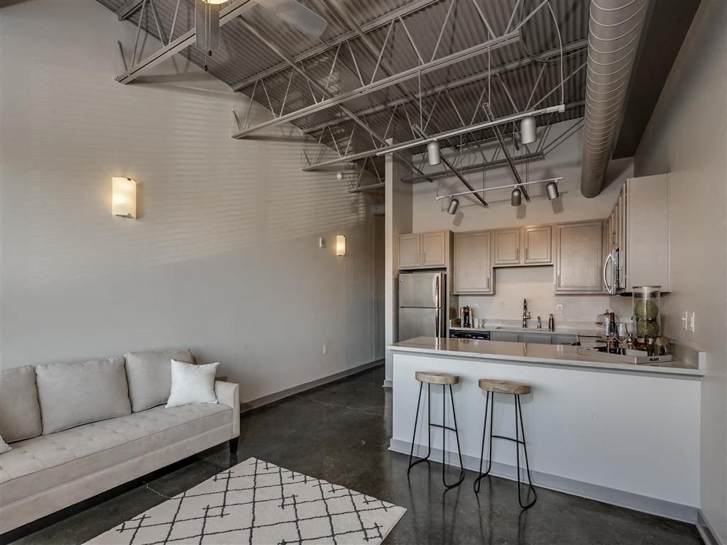 Living Rom With Kitchen Area at The Tower Apartments, Tuscaloosa, 35401