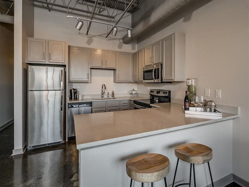 Fitted Kitchen With Island Dining Fitted Kitchen With Island Dining at The Tower Apartments, Alabama, 35401 - Photo Gallery