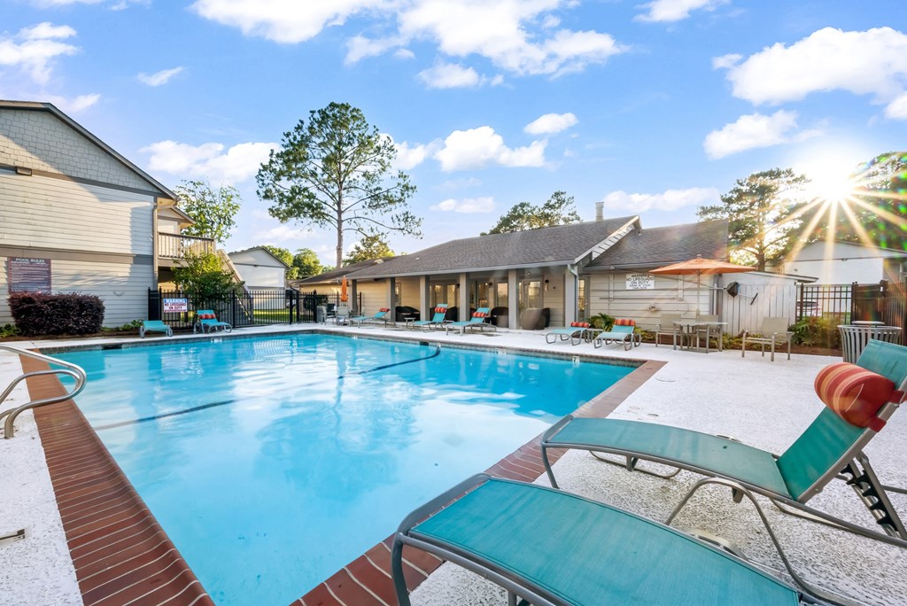Swimming pool swimming pool with lounge chairs at Retreat at Brightside Apartments in Baton Rouge, LA