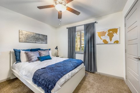 Bedroom with plush carpeting  at Retreat at Brightside Apartments in Baton Rouge, LA