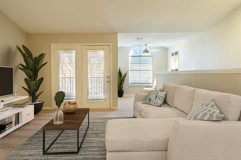 a living room with a couch and a coffee table