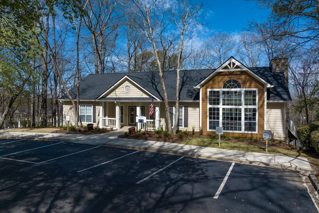 Clubhouse and parking surrounded by trees at Summerchase at Riverchase in Hoover, Alabama