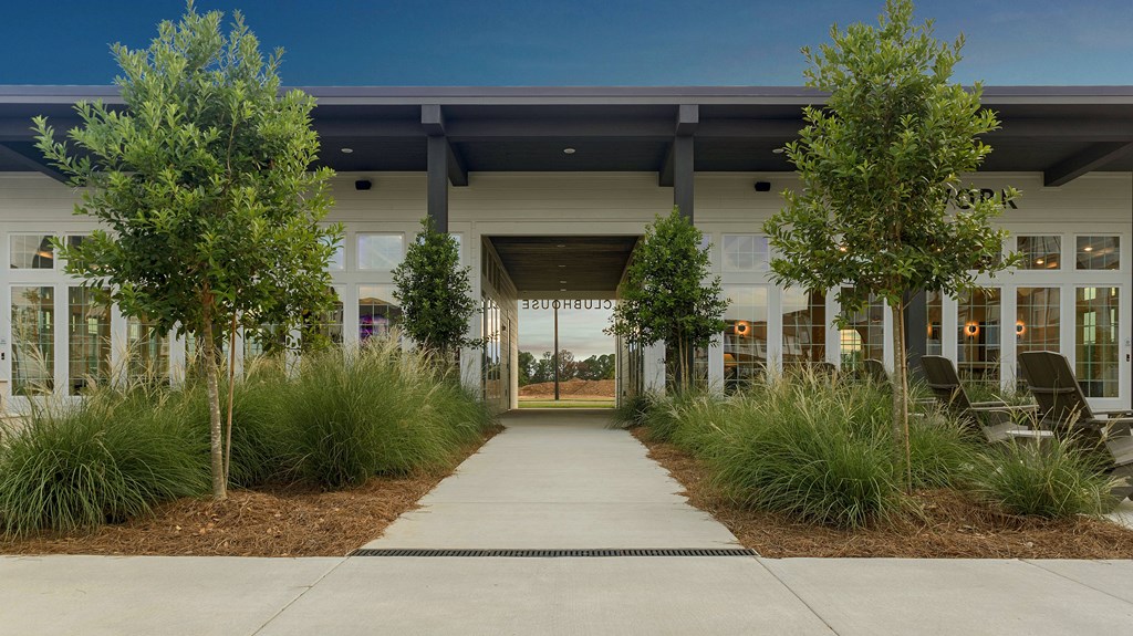 The image shows a building with a clear blue sky in the background.