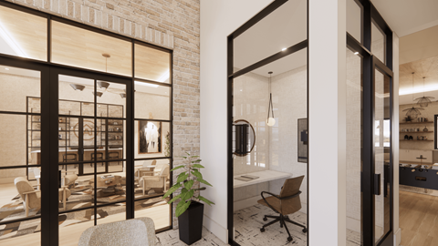 A modern living room with a brick wall and a glass door leading to a dining area.