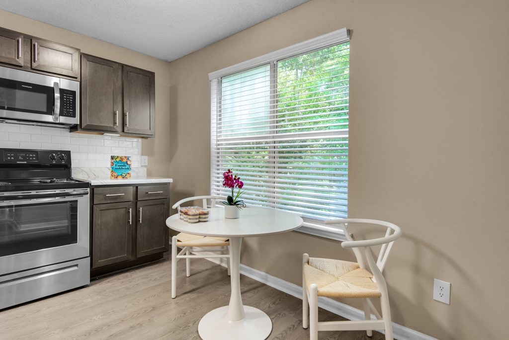 A dining table near the window in the kitchen at Crystal Lake in Pensacola, Florida.
