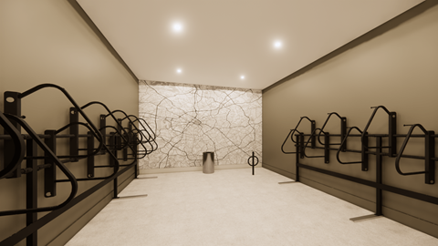 A room with a white floor and walls, a black railing, and a white wall with a black design on it.