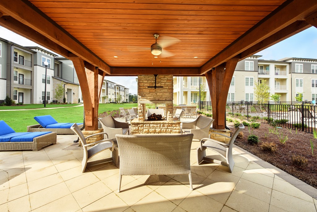 the preserve at ballantyne commons covered patio with dining table and chairs