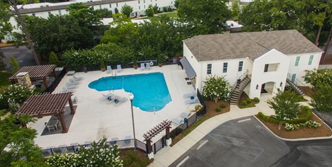 an aerial view of a swimming pool at Avia Apartments in Vestavia Hills, AL