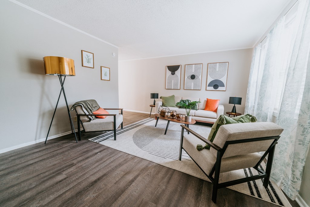 Spacious living room Living Room at Midtown Oaks Townhomes in Mobile, AL Renovated apartment Living Room at Midtown Oaks Townhomes in Mobile, AL