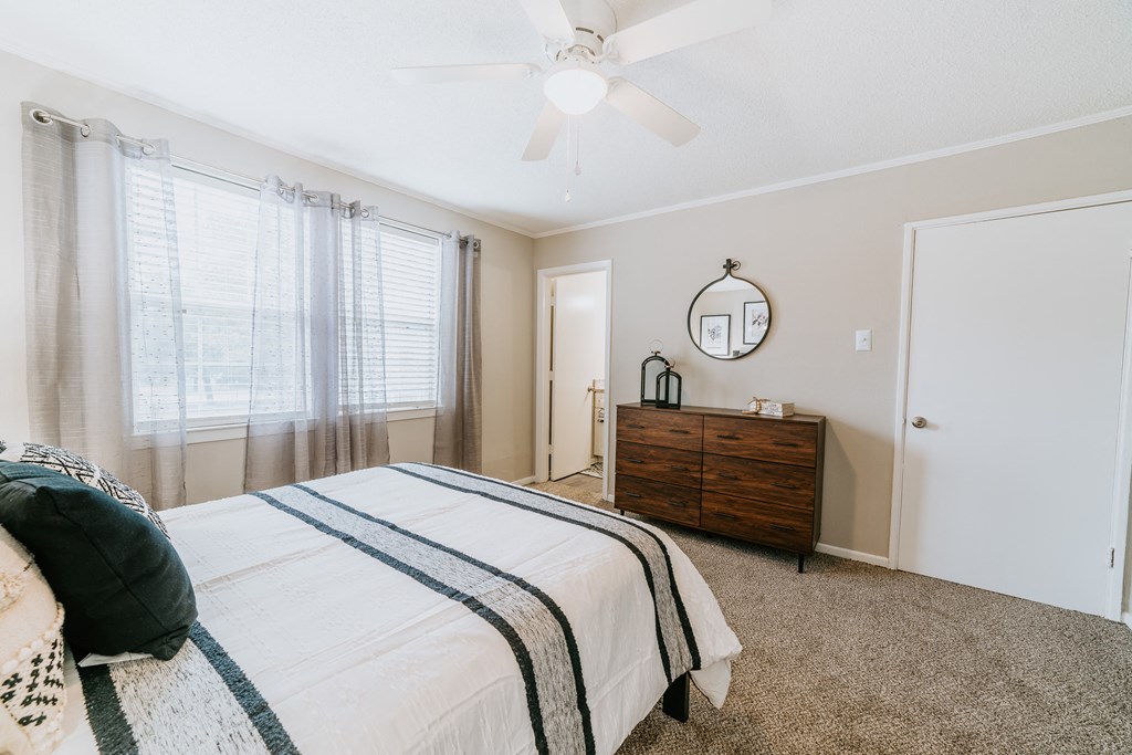 Bedroom with en-suite bathroom at Midtown Oaks Townhomes in Mobile, AL