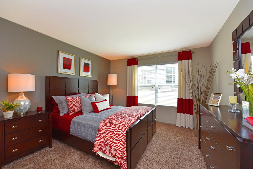 Bedroom interior with cozy bed at The Metropolitan, Kentucky
