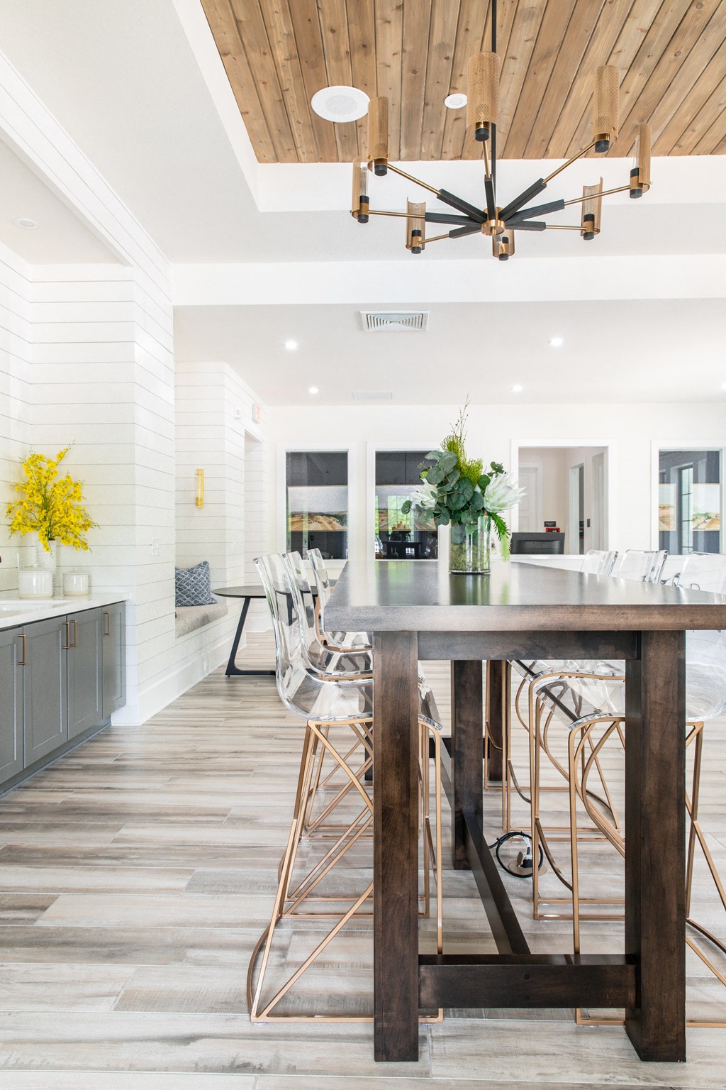 a kitchen with a table and chairs in a house
