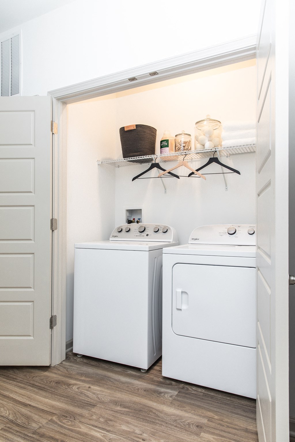 a small laundry room with a washer and dryer