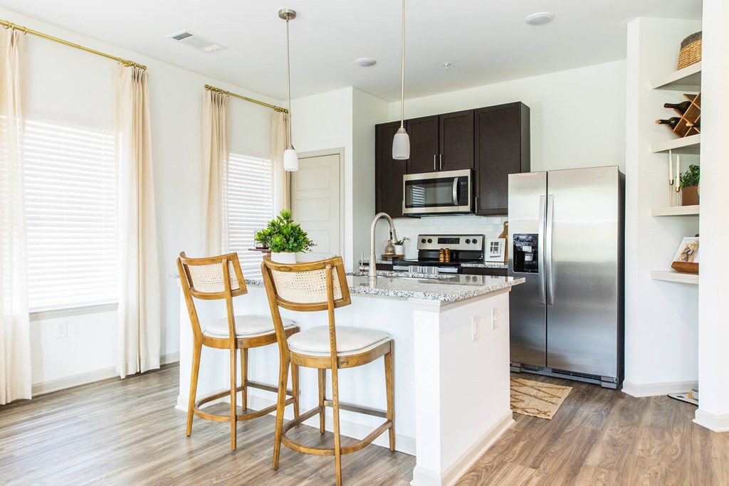 Kitchen with island at Easterwood Apartments in Gardendale, AL
