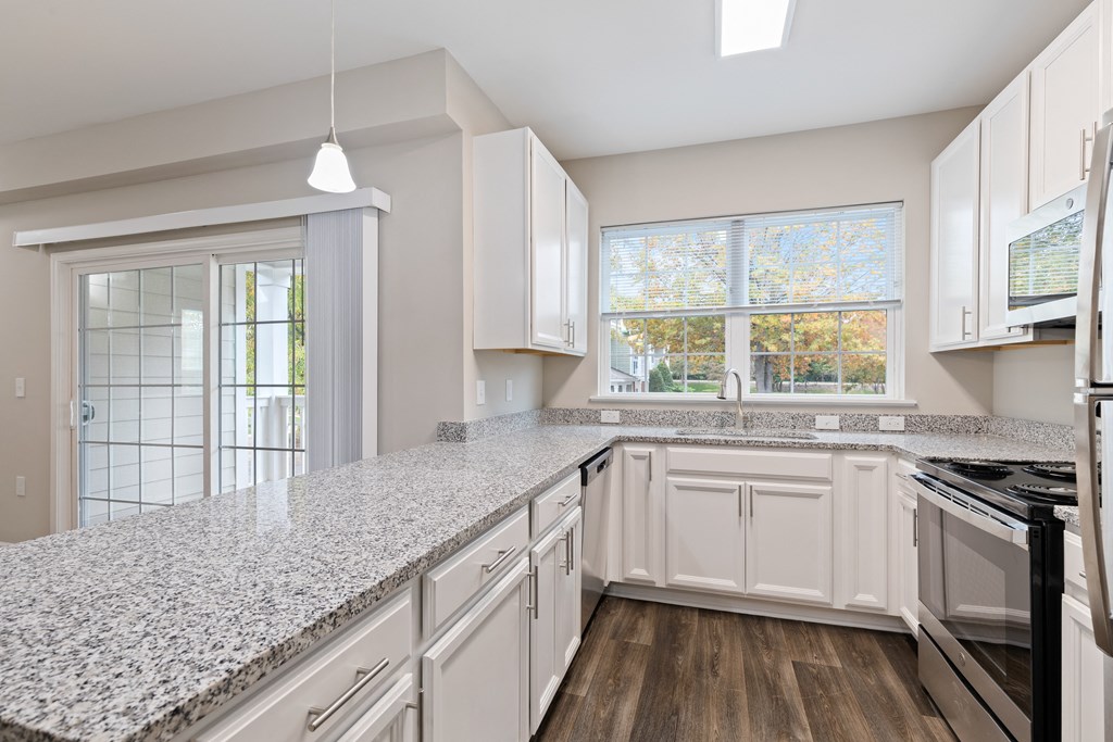 kitchen with granite counter tops at The Enclave at Crossroads, Raleigh, NC