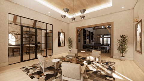 A modern living room with a large sectional sofa and a coffee table.