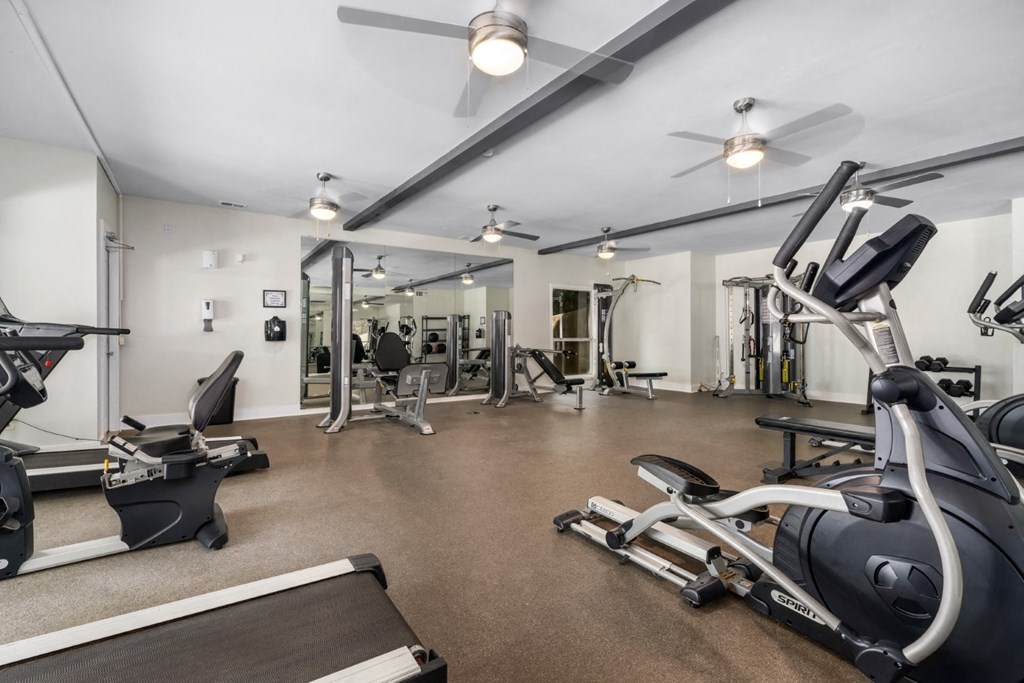Fitness center with ceiling fans and exercise equipment at Summerchase at Riverchase in Hoover, Alabama