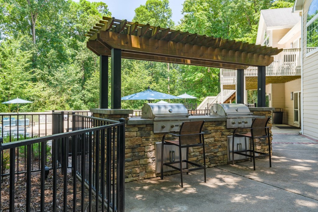 A pergola with two gas grills at Summerchase at Riverchase in Hoover, Alabama.
