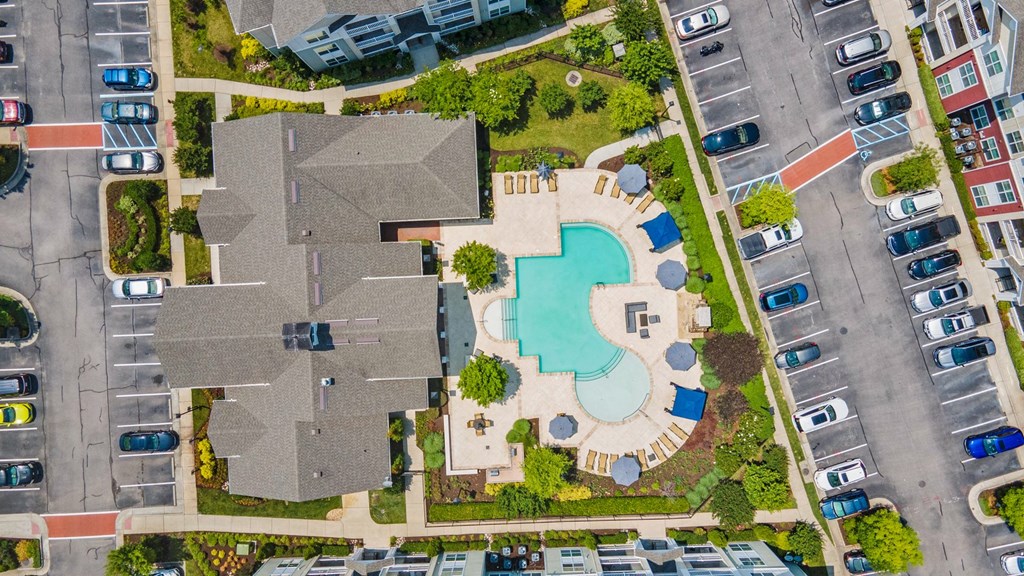 Pool with tanning deck and large parking lot area at Hampton Roads Crossing, Virginia, 23435