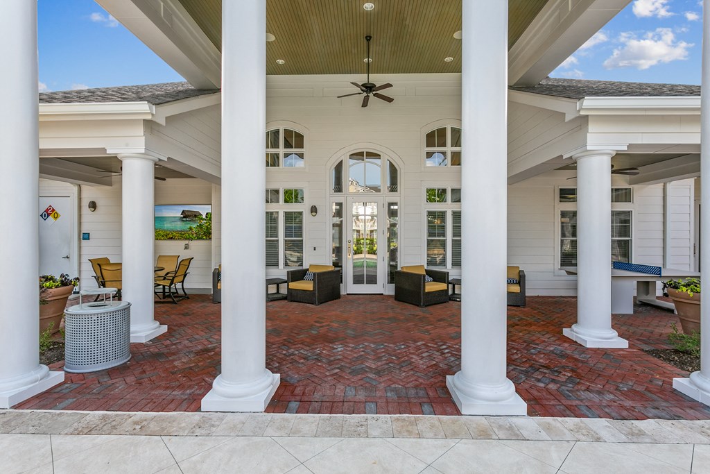 Resident Clubhouse with chairs and ceiling fans at Hampton Roads Crossing, Suffolk, VA, 23435