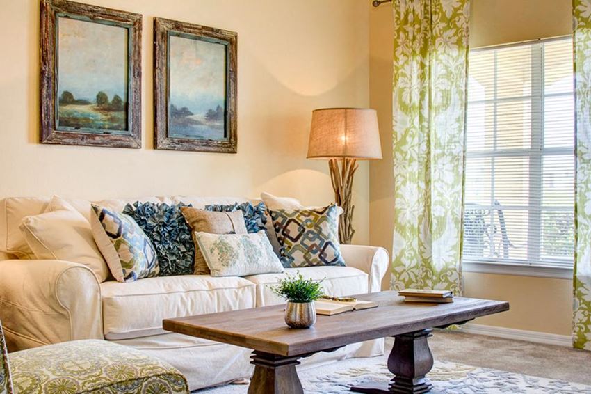 Large windows in living room at Legacy at Crystal Lake Apartments in Port Orange, Florida Living Room at Legacy at Crystal Lake Apartments in Port Orange, Florida - Photo Gallery