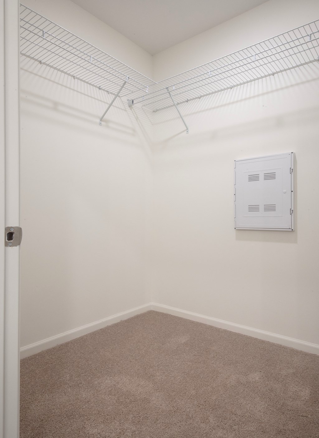 an empty room with a heater in the corner of the room at Artisan Flats in Birmingham, AL