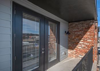 views of the city from the balcony of an apartment at Artisan Flats in Birmingham, AL