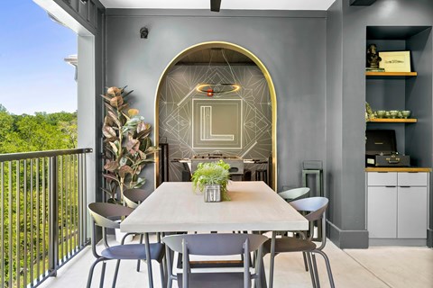 A modern dining area with a table set for four.