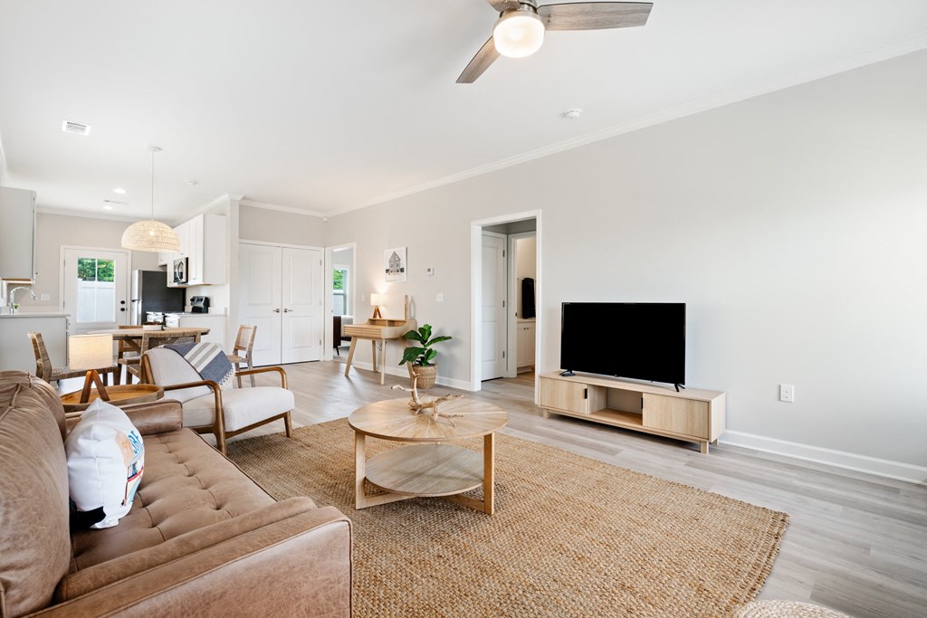 a living room with a couch and a tv