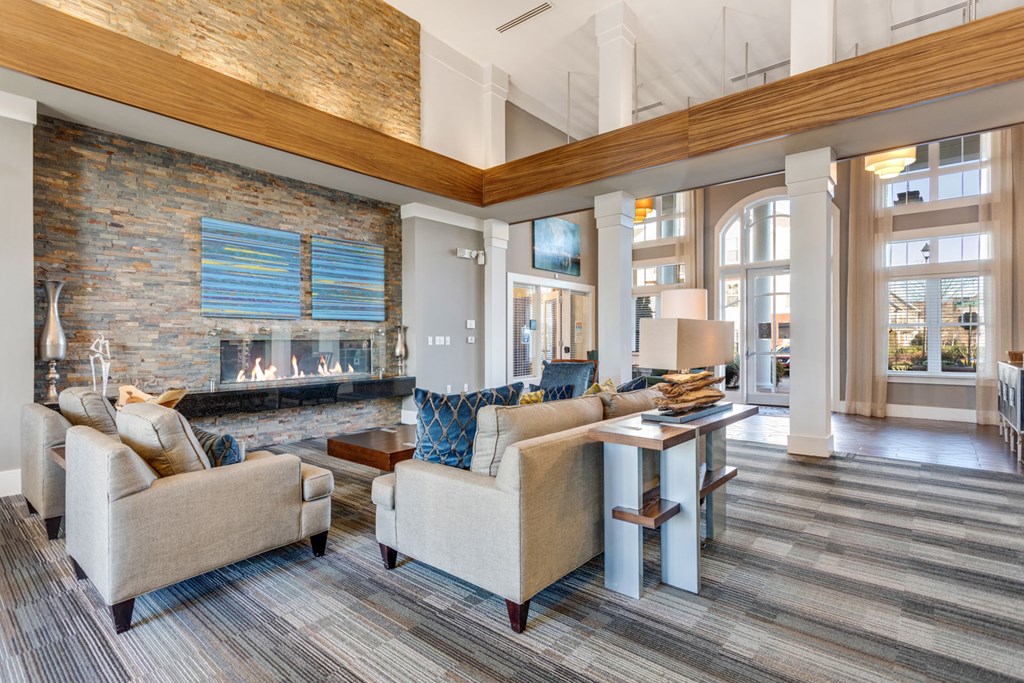 Large Community Clubhouse with Fireplace and Seating at Hampton Roads Crossing, Suffolk