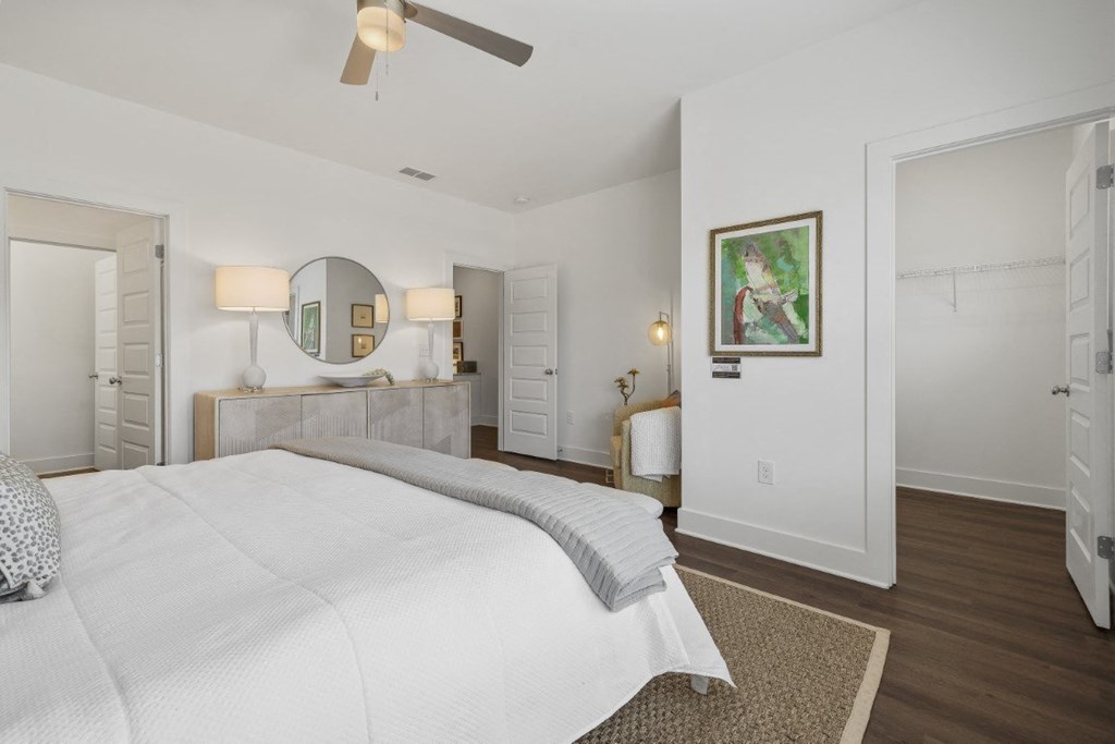 A bedroom with walk-in closet at Turnberry Park Luxury Rental Homes in Gardendale, AL
