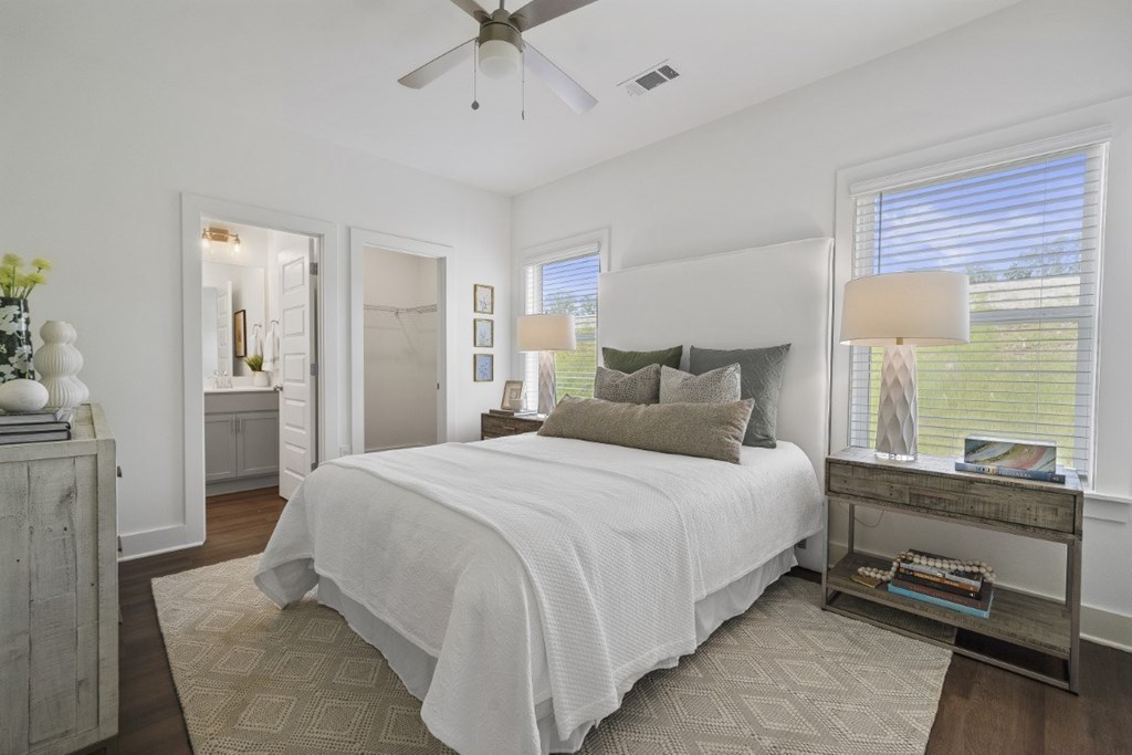 Bedroom with en-suite bathroom, ceiling fan, walk-in closet at Turnberry Park Luxury Rental Homes in Gardendale, AL