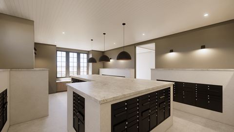 A modern kitchen with a large island and dark cabinets.