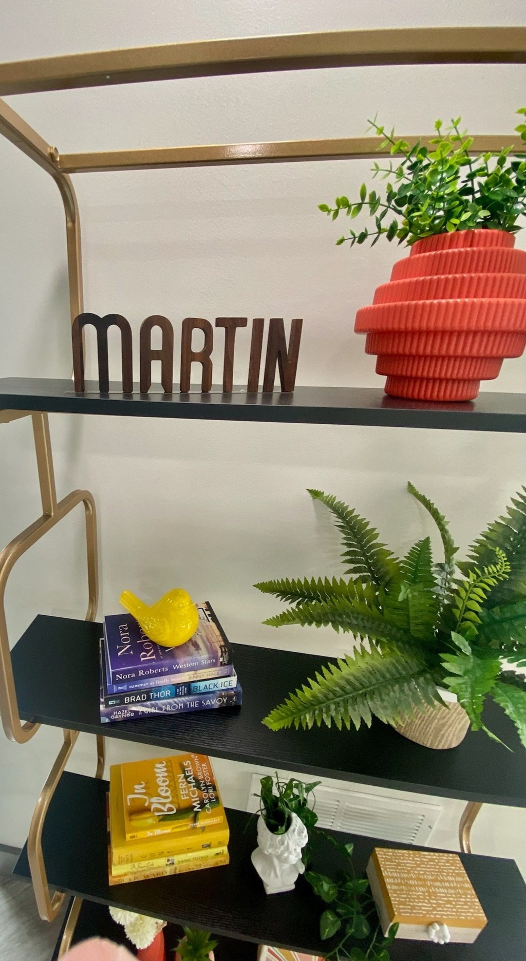 a shelf with the word martin on it