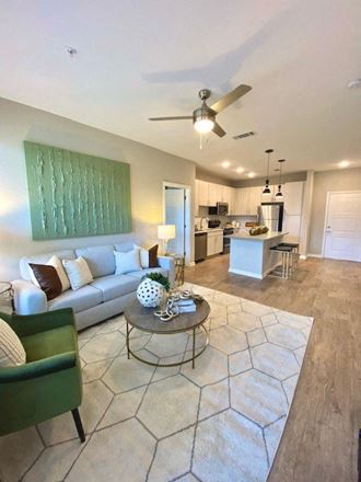 Wood style flooring and ceiling fans at Bon Haven Apartments in Spartanburg, SC Open Concept Living and Kitchen at Bon Haven Apartments in Spartanburg, SC