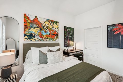A bedroom with an en-suite bathroom at Tapestry University Park apartments in Sarasota, FL