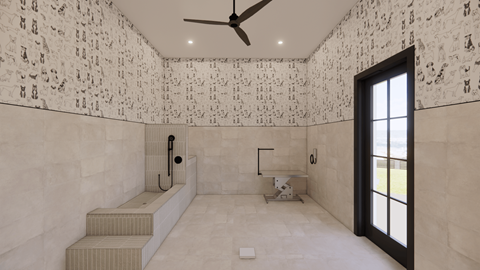 A bathroom with a wall covered in black and white photos.