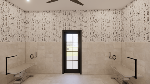 A bathroom with a wallpapered wall and a window.