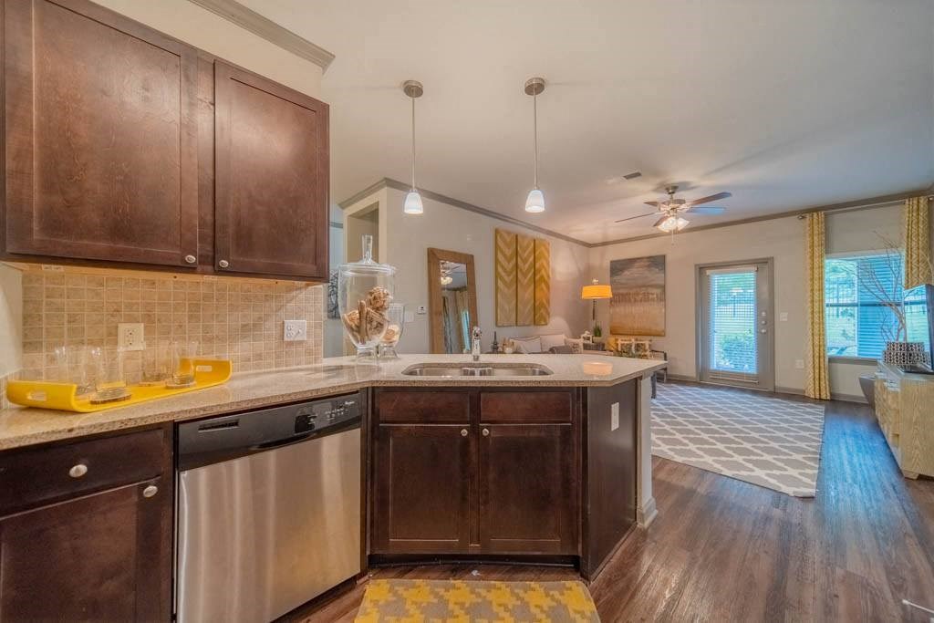 a kitchen with a sink and a counter top