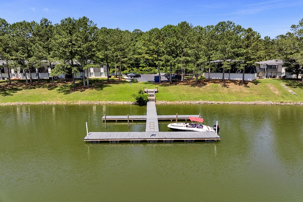 Private dock and lake at Riverhouse Apartments in Riverside, AL