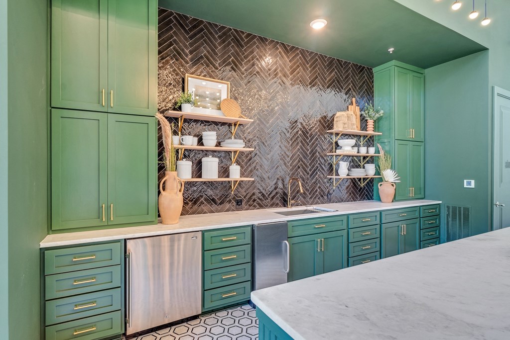 clubhouse with large kitchen and resident lounge at Tapestry Overbrook in McDonough, Georgia