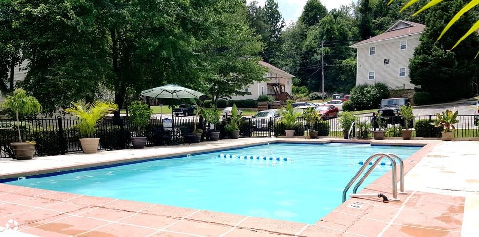 a swimming pool in the middle of a neighborhood
